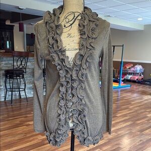 Size medium light brown cardigan w/ two closures (as pictured) and a ruffle trim
